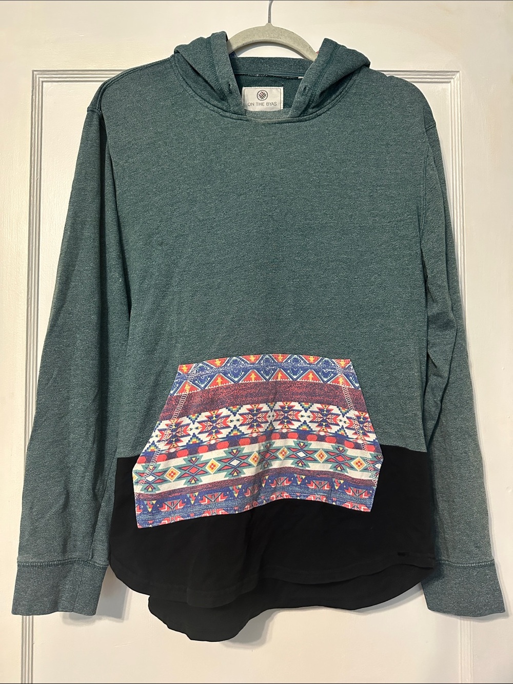 on the byas Green Hooded Sweatshirt with Printed Details on pocket & hood